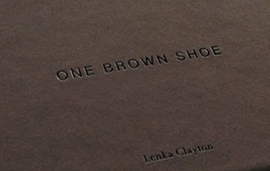 One Brown Shoe