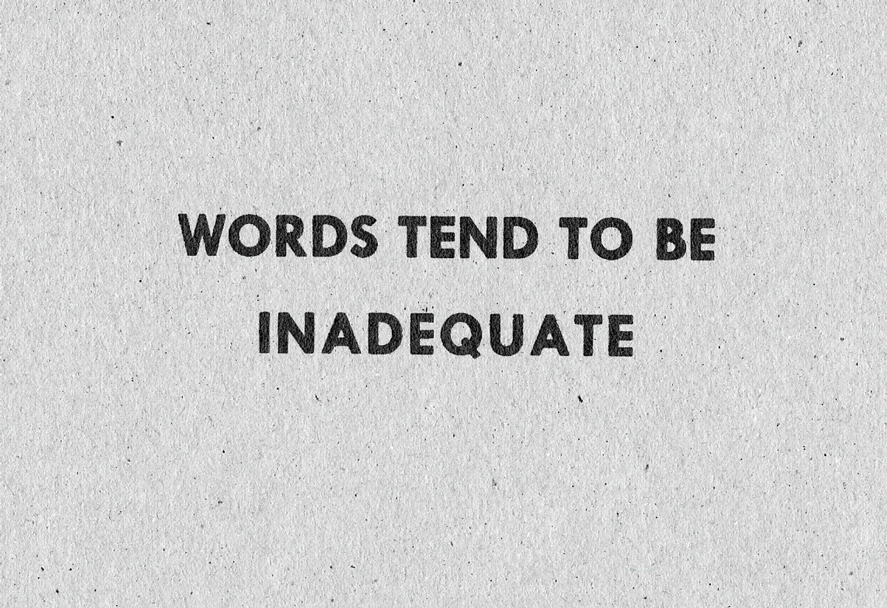 Words Tend to Be Inadequate [Black Text on Cardboard]